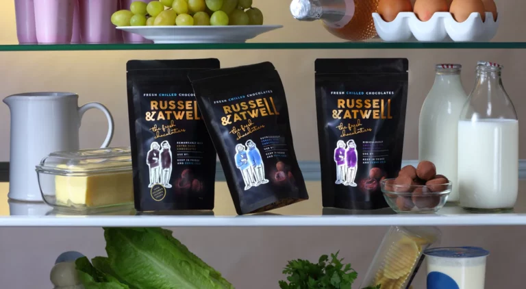 Chocolates, milk, butter, and grapes in refrigerator shelf. Russell & Atwell Chocolates In Hame sampling