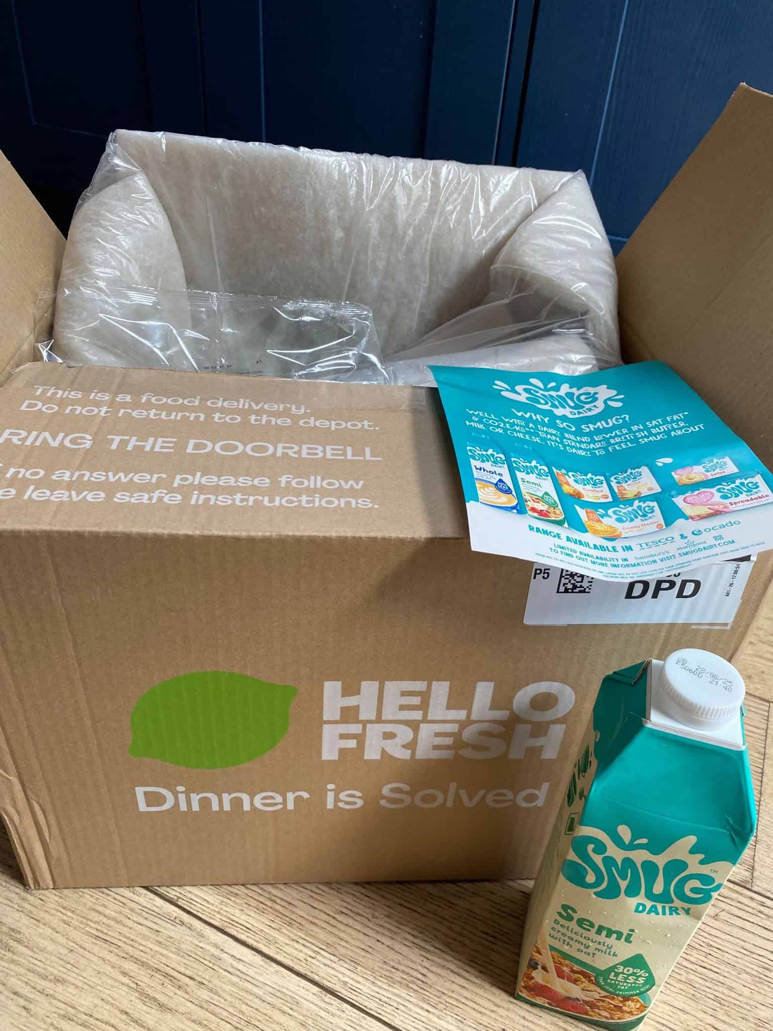 Flavour sampling delivery box with milk carton and instructions for tasting.